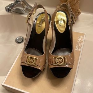 Michael Kora wedges